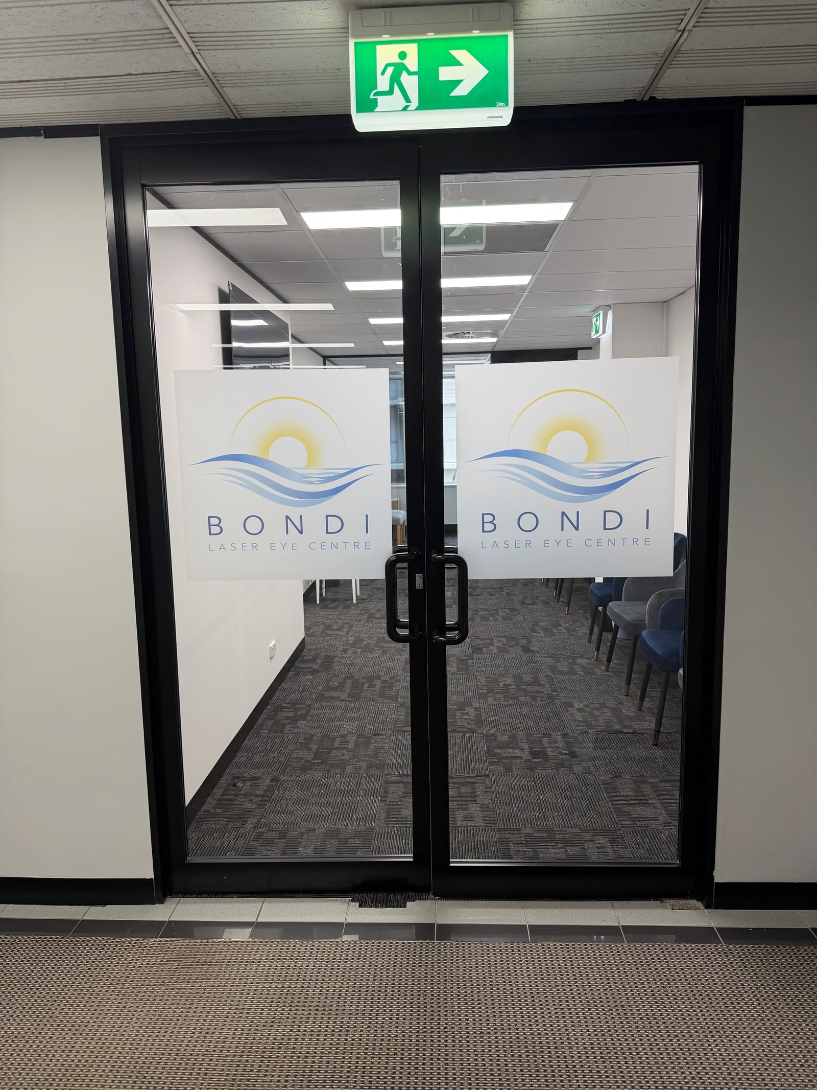 Glass entry doors with Bondi Laser Eye Centre signage